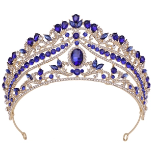 Baroque gold bridal crown with deep blue crystals and teardrop gemstones for weddings