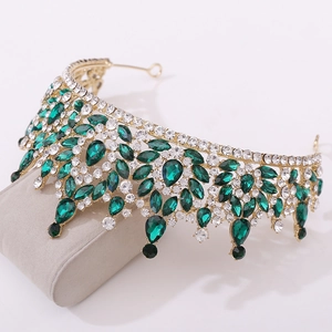Baroque bridal crown with green crystals and white diamonds on a gold base