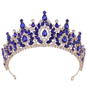 Macro view of Baroque bridal crown with royal blue crystals and sparkling silver base
