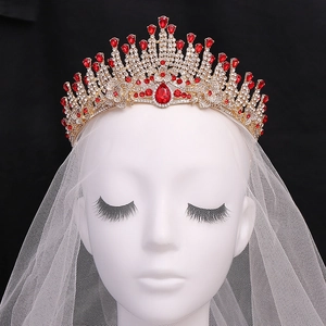 Elegant gold bridal tiara with red teardrop crystals and sparkling white rhinestones