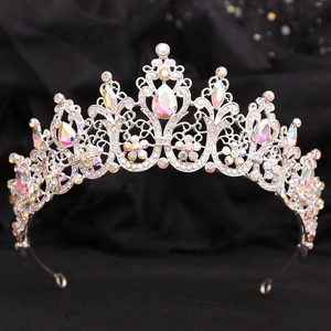 Baroque bridal tiara with colorful AB crystals and silver alloy base on black background