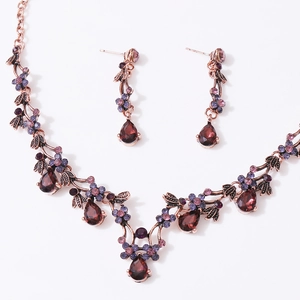 Vintage bridal jewelry set with red teardrop crystals and purple rhinestones