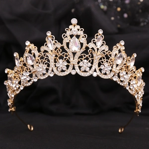 Detail of golden Baroque bridal crown with clear crystals and a large pear-shaped stone