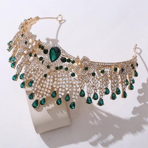 Elegant gold bridal crown with emerald green teardrop crystals and sparkling white rhinestones