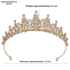 Close-up of golden bridal tiara showing marquise rhinestones and side fixing loops