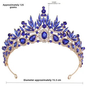 Detailed view of Baroque gold crown with blue crystals and measurement specs