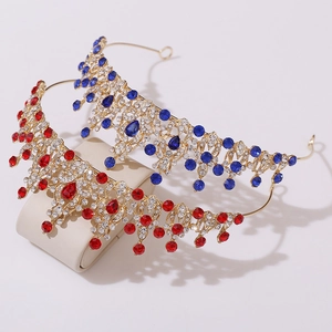 Elegant gold bridal tiaras with red and blue teardrop crystals and white rhinestones