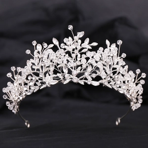 Elegant silver leaf bridal crown with crystal beads and rhinestones on black velvet