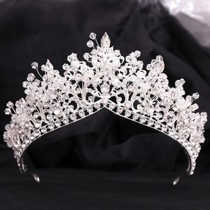 Luxury handmade silver bridal crown with glittering rhinestones and crystal beads for weddings