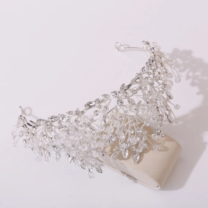 Macro view of handmade silver bridal headband with crystal beads and rhinestones
