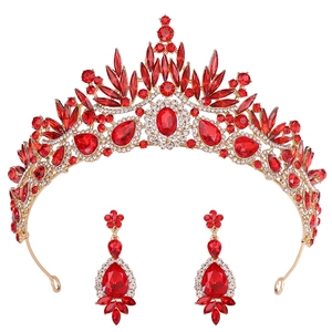 Detailed view of Baroque bridal jewelry set with red leaf crystals and gold crown