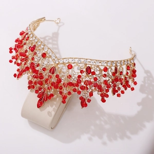 Luxurious gold alloy bridal crown with sparkling red crystals and rhinestones