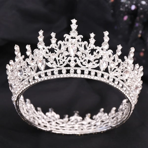 Elegant Baroque silver round bridal crown with shimmering rhinestones and drop-shaped crystals