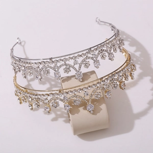 Elegant gold and silver bridal tiaras featuring fan-shaped floral rhinestones and alloy