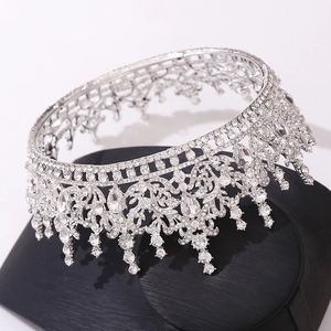 Elegant baroque bridal tiara with silver rhinestones on a black display stand