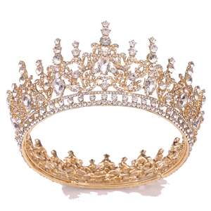 Golden baroque bridal crown with sparkling white crystals and elegant waterdrop accents