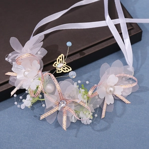Handmade bridal hairband with white tulle flowers, pearls, and golden butterflies