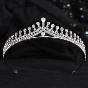 Close-up of silver bridal crown with AAA zircons and drop-shaped crystal detail