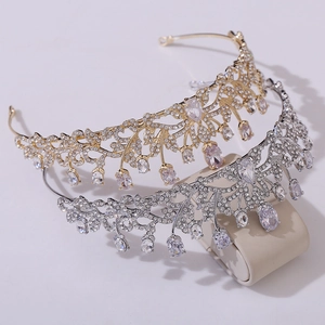 Elegant bridal tiara with hollow leaf design and pear-shaped zircon crystals in gold and silver