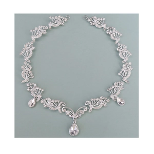 Silver flower bridal headband with sparkling crystals and pear-cut rhinestone drops