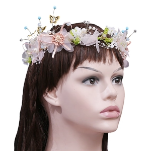 Pink floral bridal headband with handmade crystals, pearls and golden butterfly accents