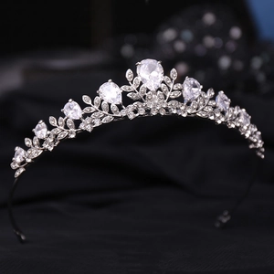 Close-up of bridal crown with silver leaf patterns and pear-shaped AAA zircon stones