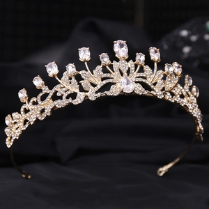 Exquisite bridal crown with hollow leaf design and zircons on a gold alloy base