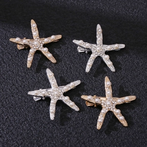 Set of four starfish hair clips with pearls and rhinestones in gold and silver finish