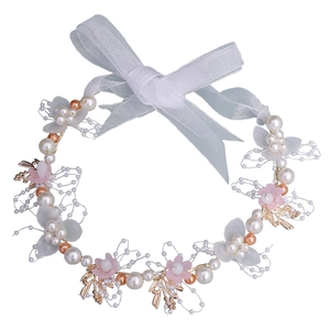 Elegant pink flower and pearl tiara crown with gold leaf details and white ribbons