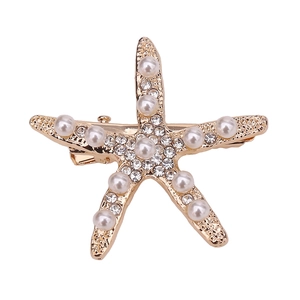 Elegant gold starfish hair clip with white pearls and sparkling rhinestones for brides