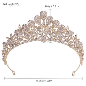 Detail view of gold wedding tiara with crystal flowers, 5.7cm height and 15cm diameter