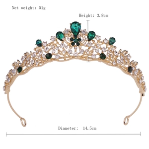 Detailed view of Baroque gold tiara with emerald crystals and size dimensions marked