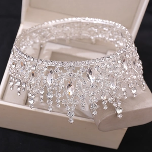 Detail of silver bridal crown featuring intricate rhinestone inlay and European vintage style