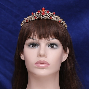 Baroque gold bridal crown with red rhinestones and crystal flower design for weddings