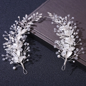 Elegant bridal hair vine with silver leaves, faux pearls, and crystals for weddings