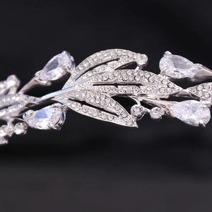 Detailed close-up of bridal crown featuring silver alloy leaves and zircon crystals
