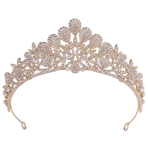 Elegant gold bridal crown with sparkling white rhinestones in a classic peacock design