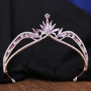 Elegant bridal crown with purple and white crystals on a silver alloy base for weddings