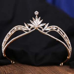 Detailed view of bridal crown featuring gold alloy base with sparkling marquise rhinestones
