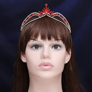 Elegant gold bridal tiara with red crystals and leaf patterns for wedding hairstyles