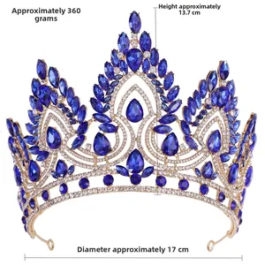 Macro detail of royal crystal crown showing blue teardrop gems and golden base metalwork