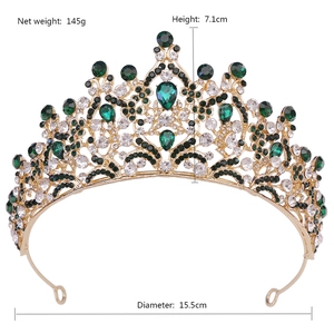 Detail view of green crystal bridal crown with dimensions 15.5cm diameter and 7.1cm height