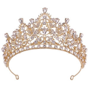 Detailed close-up of luxury bridal crown featuring teardrop and marquise cut rhinestones