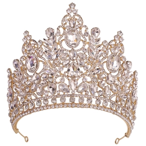 Exquisite gold bridal tiara with sparkling crystal clusters on a clean white background