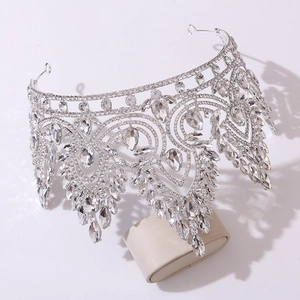Macro detail of the silver crystal tiara showcasing teardrop rhinestones and layered design