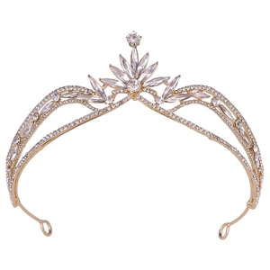 Close-up of crystal leaf bridal crown with sparkling rhinestones and golden alloy base
