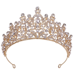 Detailed macro view of the gold alloy bridal crown with sparkling white rhinestones