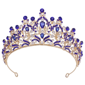 Elegant gold bridal crown with deep blue crystals and rhinestones for wedding occasions