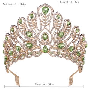 Detail view of pageant crown showing size dimensions and green pear-shaped gemstones