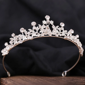 Elegant silver bridal tiara with sparkling crystal flowers and leaf motifs for weddings